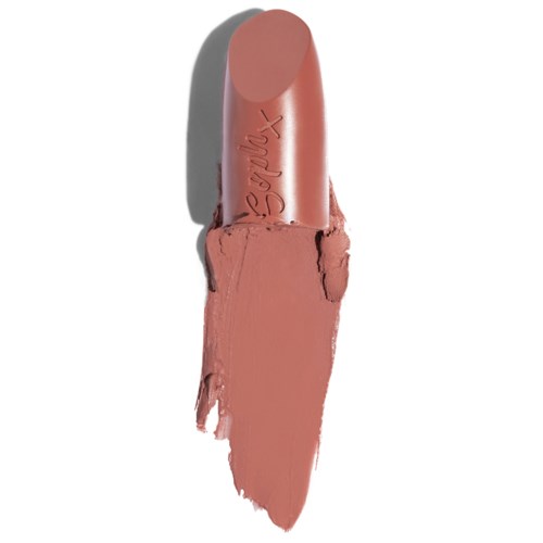 A lipstick with the brand name 'Seint' is shown, partially smeared on a white surface.