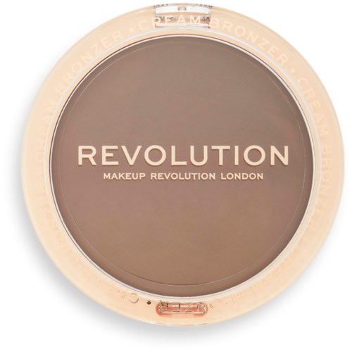 En rund makeupprodukt märkt 'REVOLUTION' med tilläggstext 'MAKEUP REVOLUTION LONDON'.