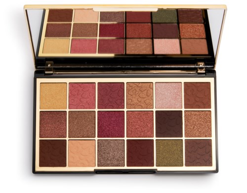 En makeuppalett med 20 olika nyanser av ögonskugga, rosa, bruna, röda och guld, arrangerade i ett rektangulärt fall.