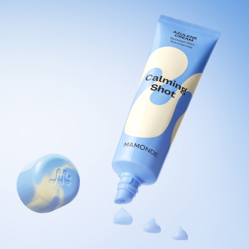 A tube of calming cream connected to a swirl of cream and droplets, with soft blue background.