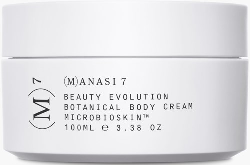 A white jar labeled Manasi 7, with text about a botanical body cream and Microbioskin, 100ml.