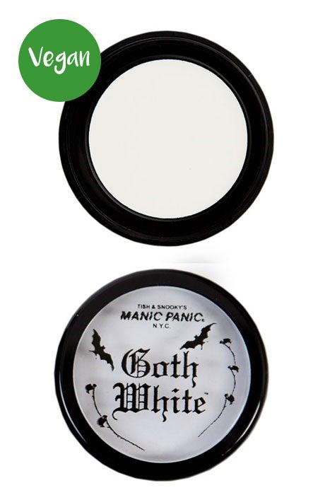 Vegans läppbalsambehållare med etikett som säger 'Goth White' och små svarta fladdermusillustrationer.