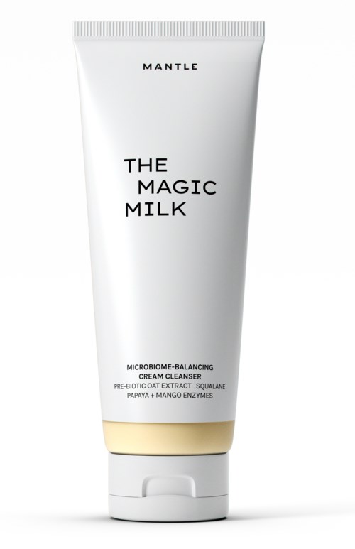 En vit tub med svart text visar en produkt som heter 'The Magic Milk' av Mantle, en rengöringskräm med naturliga ingredienser.