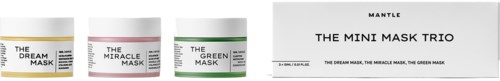 Three small jars of face masks with different colors and a box labeled "The Mini Mask Trio" next to them.