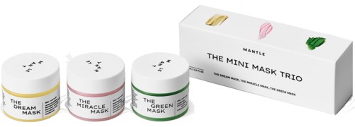 Three jars labeled as masks in yellow, pink, and green sit next to a box with the same three colors and mask names.