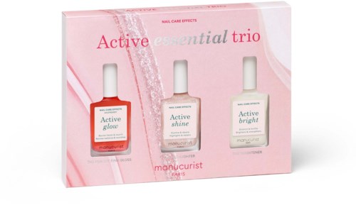 Eine Box mit drei Nagelpflegeprodukten aus der Active Essential Trio Reihe in Pink und Weiß.