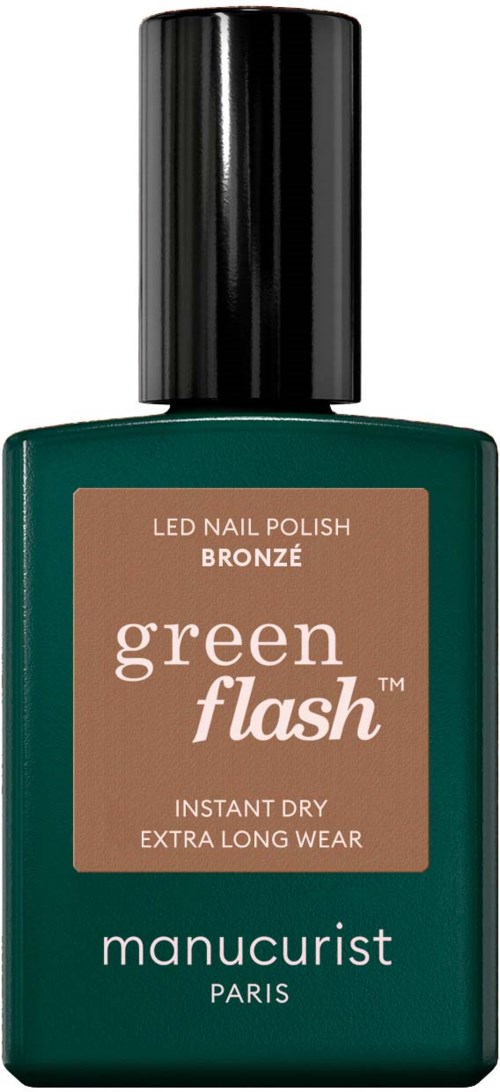 Vihreä kynsilakkapullo, jonka korkki on musta, ja etiketti lukee "green flash" manucurist Paris, kestävät kynnet.