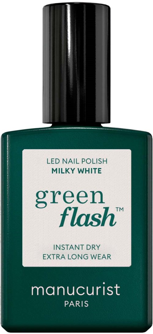 Green nail polish bottle with a black cap, labeled 'green flash', 'MANUCURIST PARIS', and information about dry and long wear.