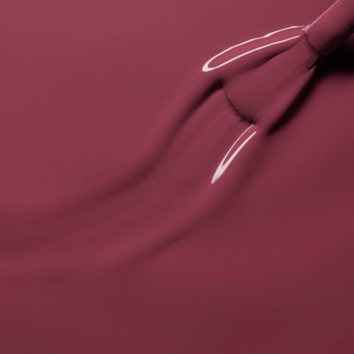 A pink object with white lines on a pink background, appearing as a stylized face or abstract design.