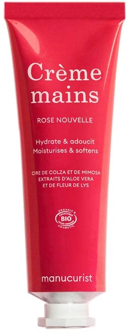 Pink tube håndcreme med hvid tekst, mærket Crème mains Rose Nouvelle af Manucurist.