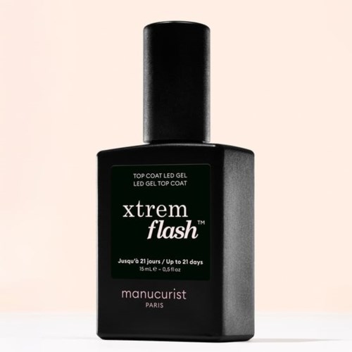 Eine schwarze Flasche mit Manucurist Paris XTREM Flash LED Gel-Überzug.