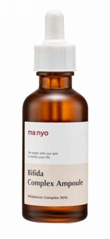 A small amber glass bottle with a white dropper cap and label, called Bifida Complex Ampoule, used for skincare.