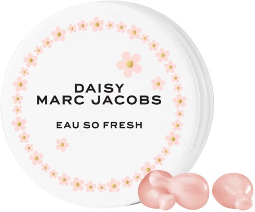 A round white container with pink flowers and a product name, along with three pink heart-shaped items outside.
