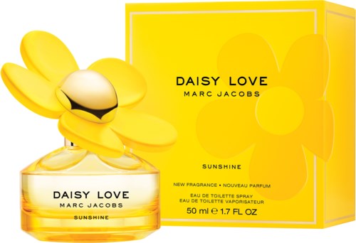 En ljusgul parf瓶flaska med en stor daggbladskapsel och förpackning märkt Daisy Love Sunshine av Marc Jacobs.