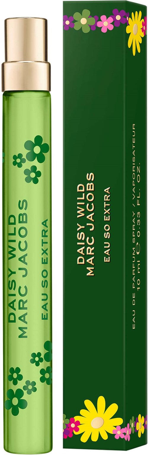 A green perfume bottle with floral designs next to a matching box featuring flowers.