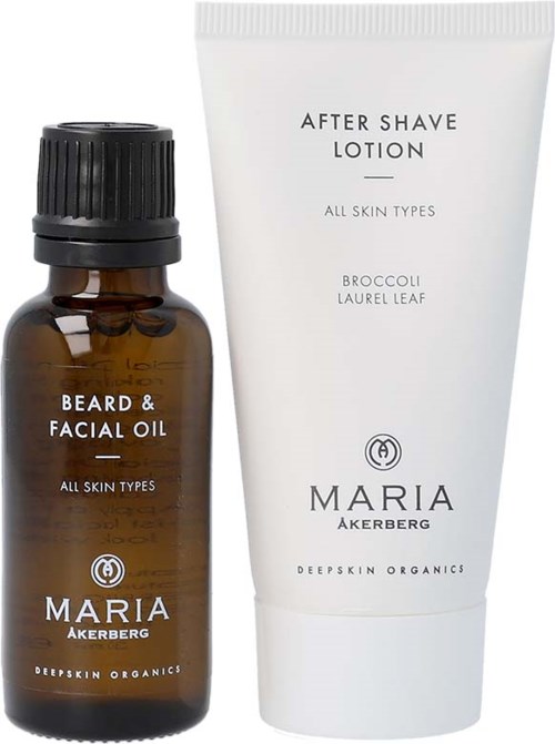 Kaksi ihonhoitotuotetta, öljypullo ja lotion-tube, molemmat Maria Åkerbergiltä, kaikille ihotyypeille.