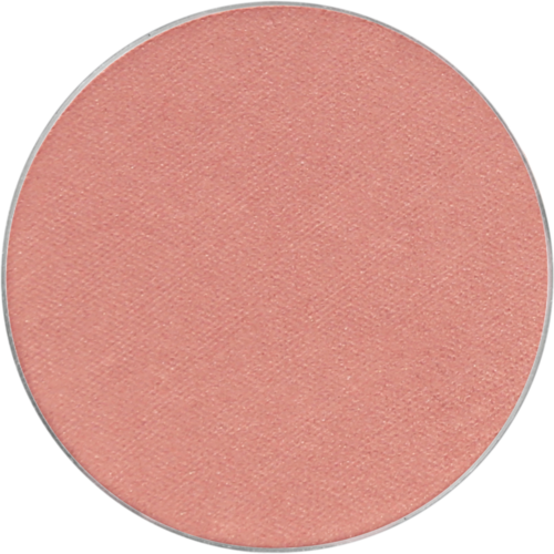 En rund, lyserød makeup blush eller pudder med en glat overflade og let tekstur.