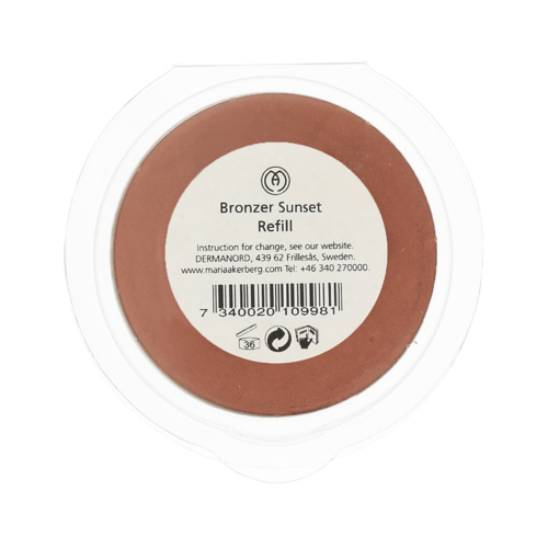 En rund behållare av bronzer smink kallad 'Bronzer Sunset Refill' med en etikett som visar instruktioner och streckkod.