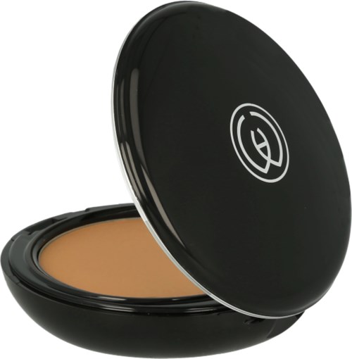 En svart compact med en spegel innehåller beige puder för smink.