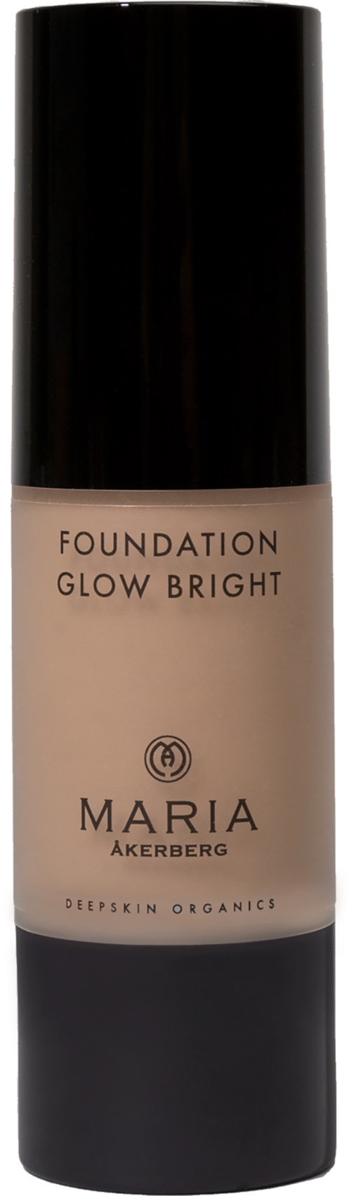 Beige meikkivoidepullo, jossa on musta kansi ja etiketti 'Foundation Glow Bright' ja 'Maria Åkerberg.'