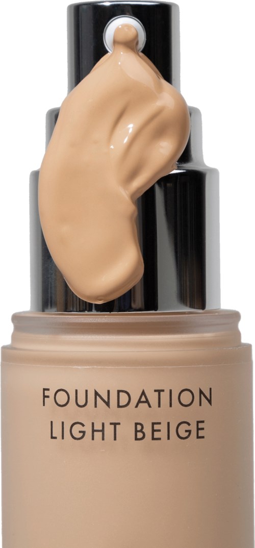 Een fles foundation met de tekst "Light Beige" en beige vloeistof bovenop.
