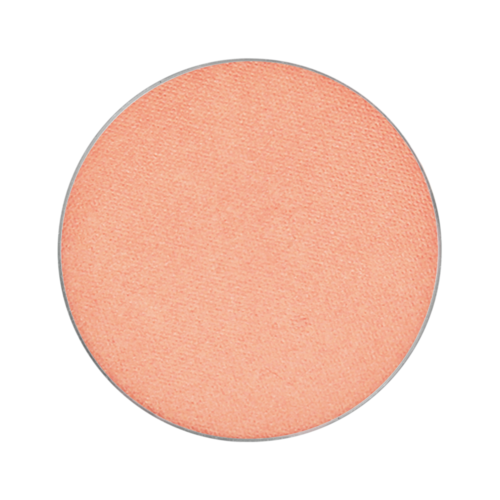 En rund, ferskenfarvet makeup blush med glat overflade og blød tekstur.
