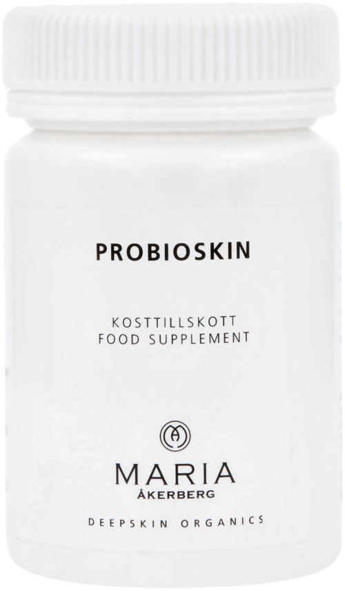 En hvit beholder med lokk, merket 'PROBIOSKIN', 'KOSTTILSKUDD' og 'MARIA ÅKERBERG'.