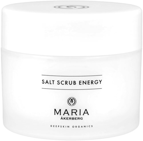 En vit burk märkt 'Salt Scrub Energy' av Maria Akerberg, innehållande kroppsskrubb, med enkel design.