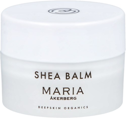 En vit burk märkt Shea Balm Maria Akerberg, tillverkad av Deepskin Organics, används för hudvård.