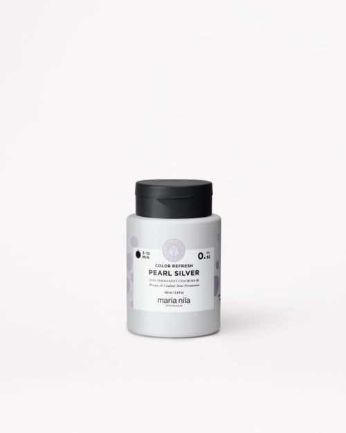 En vit burk med svart lock märkt 'Pearl Silver' av Maria Nila, ett hårfärgsprodukter.