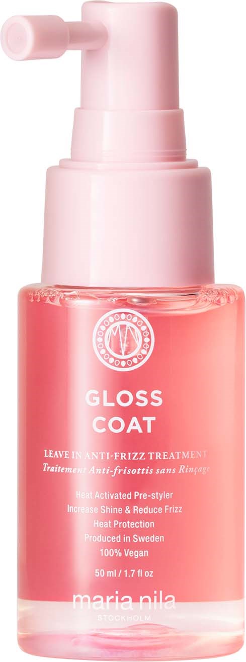 En rosa flaska med sprayhuvud som är märkt Gloss Coat, används för att ge hårglans och skydda mot värme.