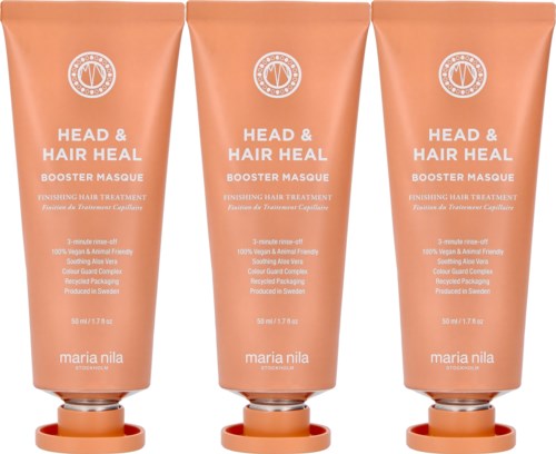 Drei pfirsichfarbene Tuben von Maria Nila Head & Hair Heal Booster Masque für Haarbehandlung, aufrecht mit offenen Deckeln.
