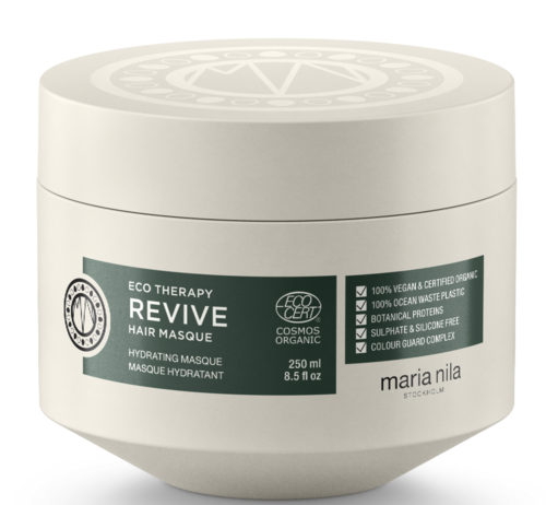 En vit burk med hårmask märkt Eco Therapy Revive, med grönt och svart text, innehållande 250ml produkt.