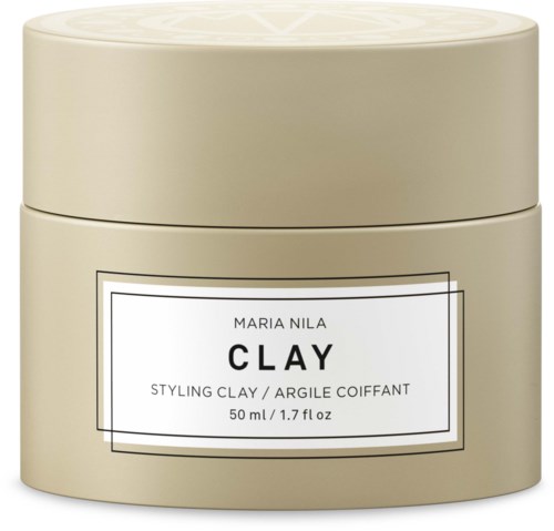 En beige beholder med etiket til Maria Nila Clay styling clay, 50 ml, 1,7 fl oz.