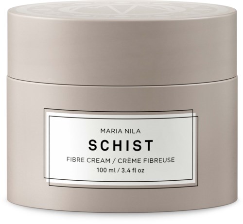 En beige burk med en etikett, innehållande fiberkräm av Maria Nila som heter SCHIST, 100 ml.