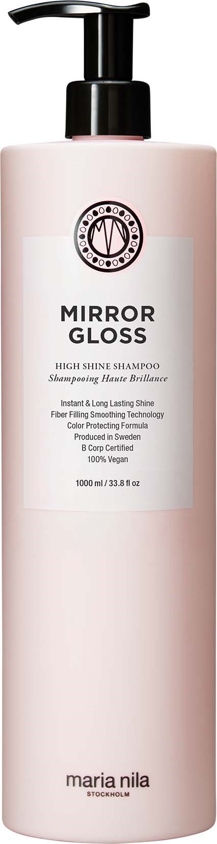 Ljusrosa flaska med svart pump innehåller Mirror Gloss schampo för glänsande, långvarigt hår. Etiketten visar varumärket Maria Nila.