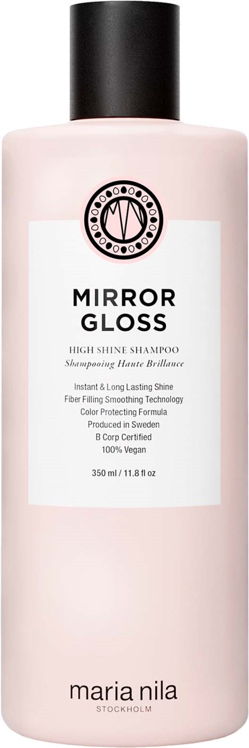 En rosa flaska med Mirror Gloss högblank schampo med svart lock, etiketten visar produktinformation och varumärke.