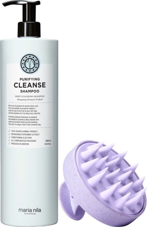 A white bottle labeled 'Purifying Cleanse Shampoo' with a black pump, and a purple scalp massager with spikes.