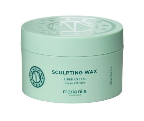 En rund, mintgrøn beholder mærket 'Sculpting Wax Fiber Cream' af Maria Nila fra Stockholm.