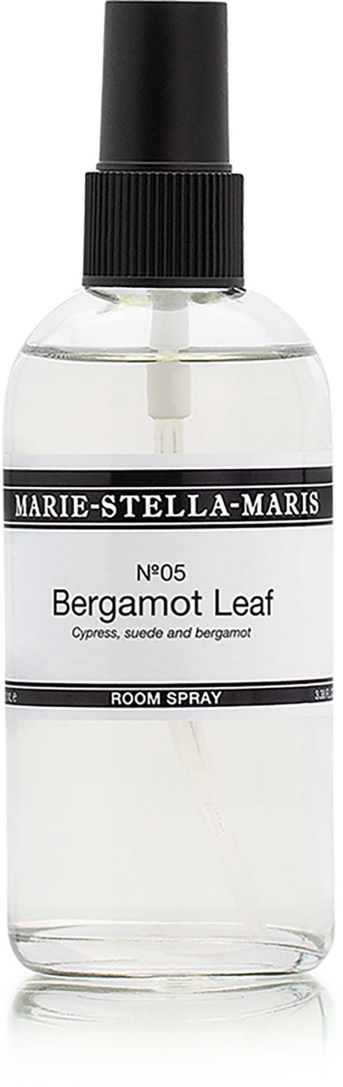 A clear spray bottle labeled Bergamot Leaf with black cap, containing room spray with notes of citrus and bergamot.