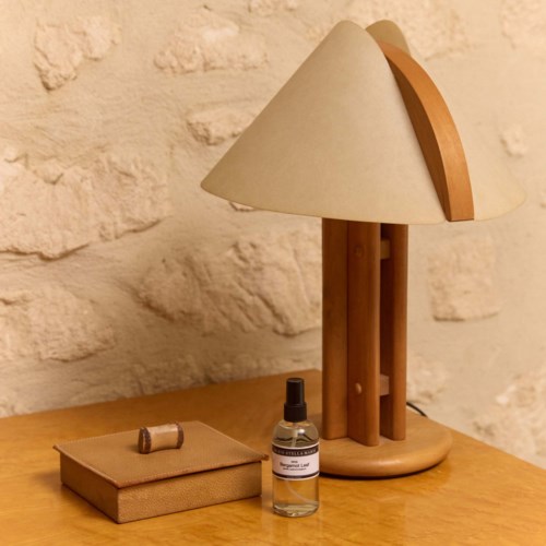 A room spray bottle and box with yellow and white stripes saying Bergamot Leaf and Marie-Stella-Maris.