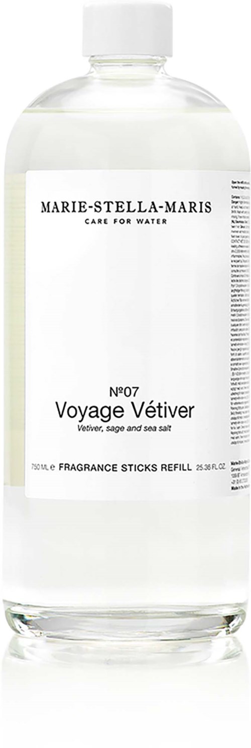 En klar flaske mærket Marie-Stella-Maris med ordet Voyage Vetiver og refill til duftstænger.