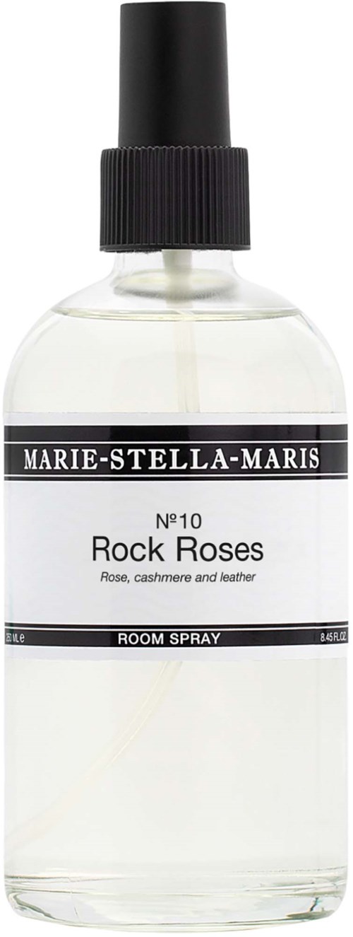 En tydlig glaskolv med spraym skriven Marie-Stella-Maris Rock Roses room spray med svart lock.