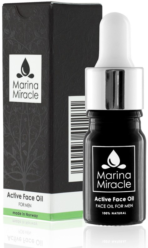 Liten svart flaska med pipett, märkt Marina Miracle, bredvid en svart box. Innehåller ansiktsolja för män.