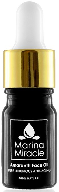 En liten svart flaske med pipette-hette merket 'Marina Miracle Amaranth Face Oil' for hudpleie.
