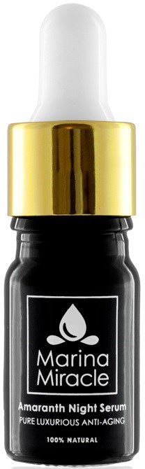 En liten svart flaske med gullokke og hvit pipette, merket Marina Miracle Amaranth Night Serum.