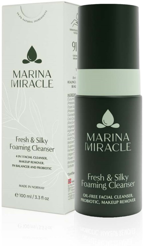 En flaske og en eske med Marina Miracle Fresh & Silky Foaming Cleanser. Flasken er svart med en grønn stripe og logo.