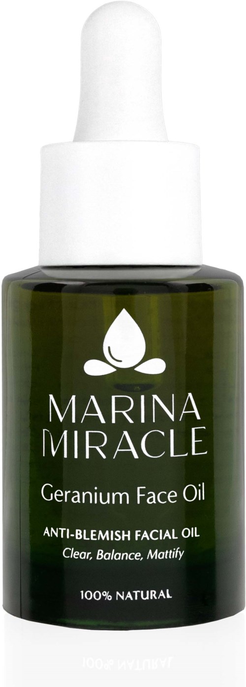 Grønn flaske med hvit pipette, merket sier Marina Miracle Geranium Face Oil, naturlig, hjelper med å rense huden, noen rosa og grønne blomster.