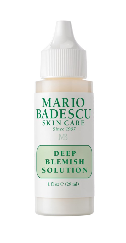 A small white bottle with a dropper top, labeled Mario Badescu Skin Care Deep Blemish Solution, designed for acne.