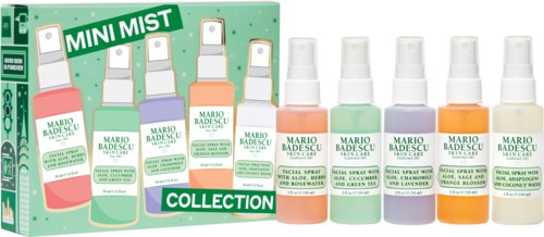 A collection of small spray bottles labeled 'Mario Badescu Mini Mist', with different colors and flavors.